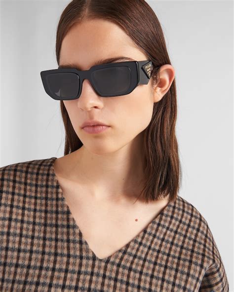 Slate Gray Lenses Exclusive To Prada Sunglasses .